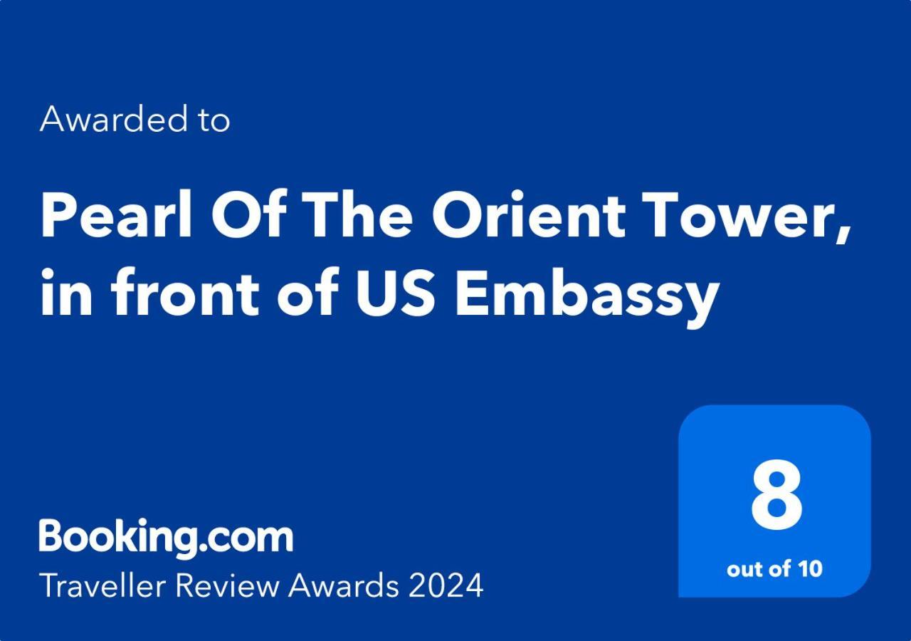 Pearl Of The Orient Tower, In Front Of Us Embassy Apartman Manila Kültér fotó
